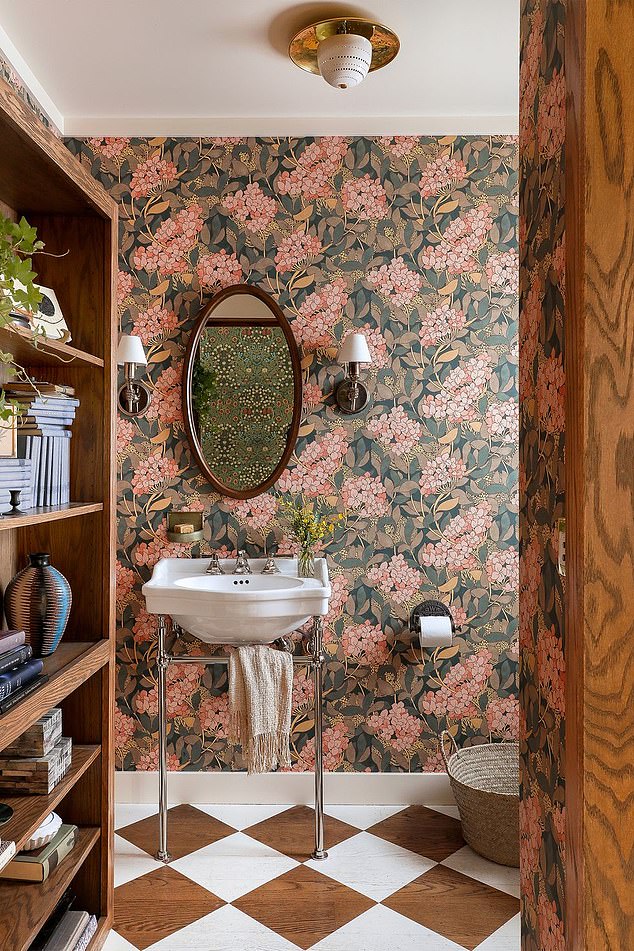 Even the most compact room can be fun. Part flowery fantasy, part Agatha Christie whodunnit, this powder room by landedinteriors.com packs a modern punch while feeling timeless. For a range of floral wallpapers try grahambrown.com